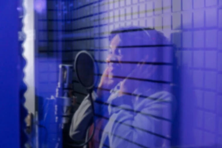 singer in a recording studio